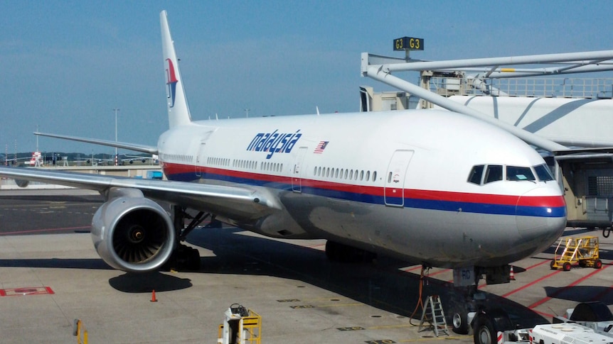 Malaysia Airlines Flight MH17 at Schiphol Airport in Amsterdam before taking off on July 17, 2014