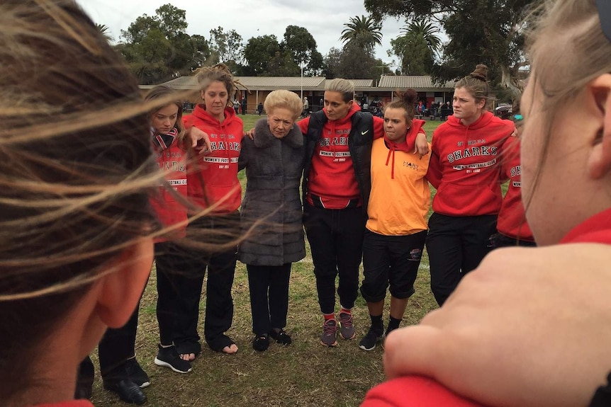 Moana Hope and Susan Alberti in the Sharks' huddle.