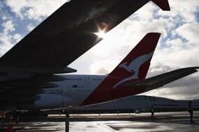 File photo: A Qantas A380 Airbus berthed at Auckland International Airport (Getty Images: Phil Walter)