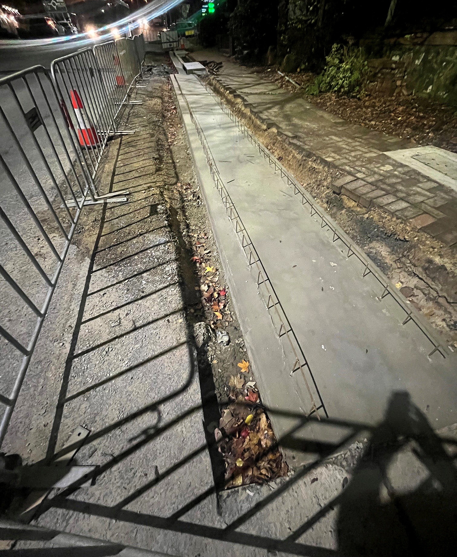 concrete laid alongside a footpath