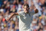 England bowler Sam Curran leaps in the air and loads up a fist pump during a Test match against Australia.