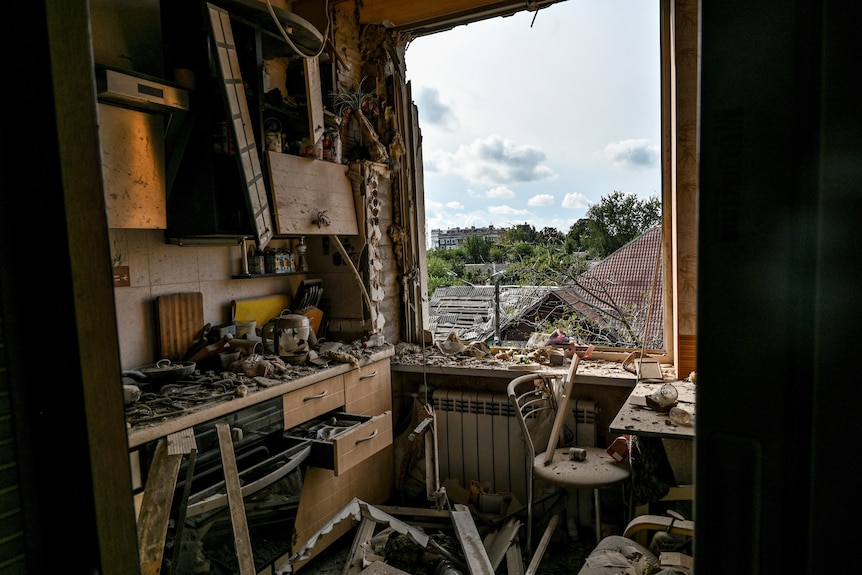 A view shows a kitchen of a residential building damaged by a Russian missile strike in Zaporizhzhia, Ukraine
