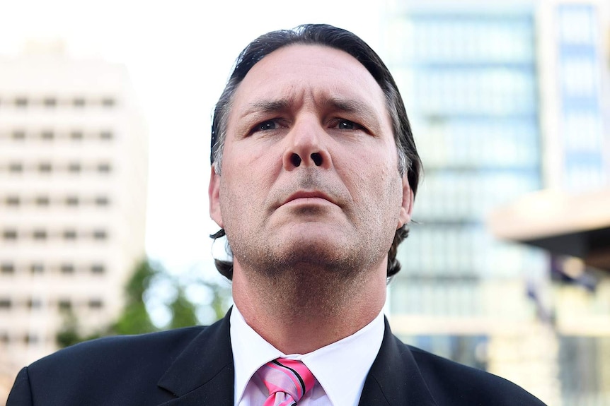 Suspended policeman Chris Hurley outside court in Brisbane