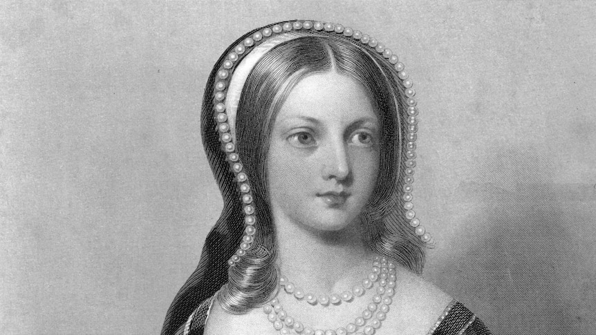 A black and white portrait shows a young woman wearing pearls around her neck and thick gown with hood