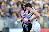 Andrew Brayshaw of the Dockers leaves the field injured against West Coast in the Western Derby.