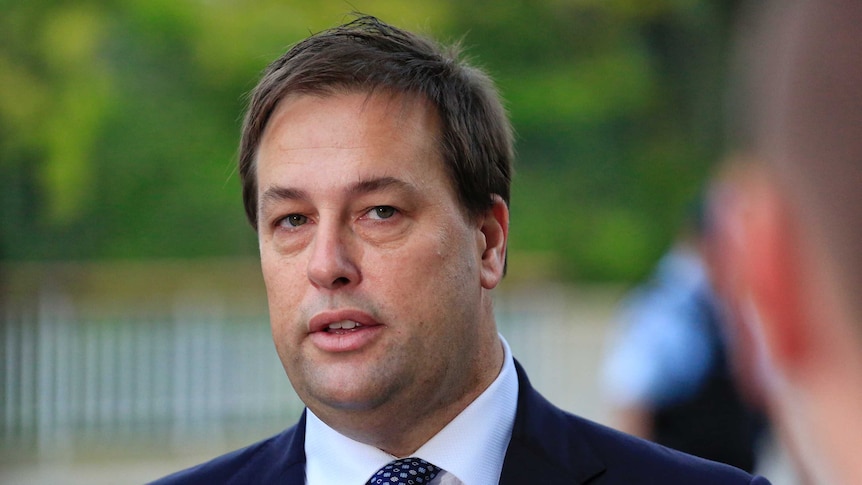 Jason Falinksi speaks to reporters outside Parliament House