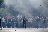 Tunisian protesters clash with riot police