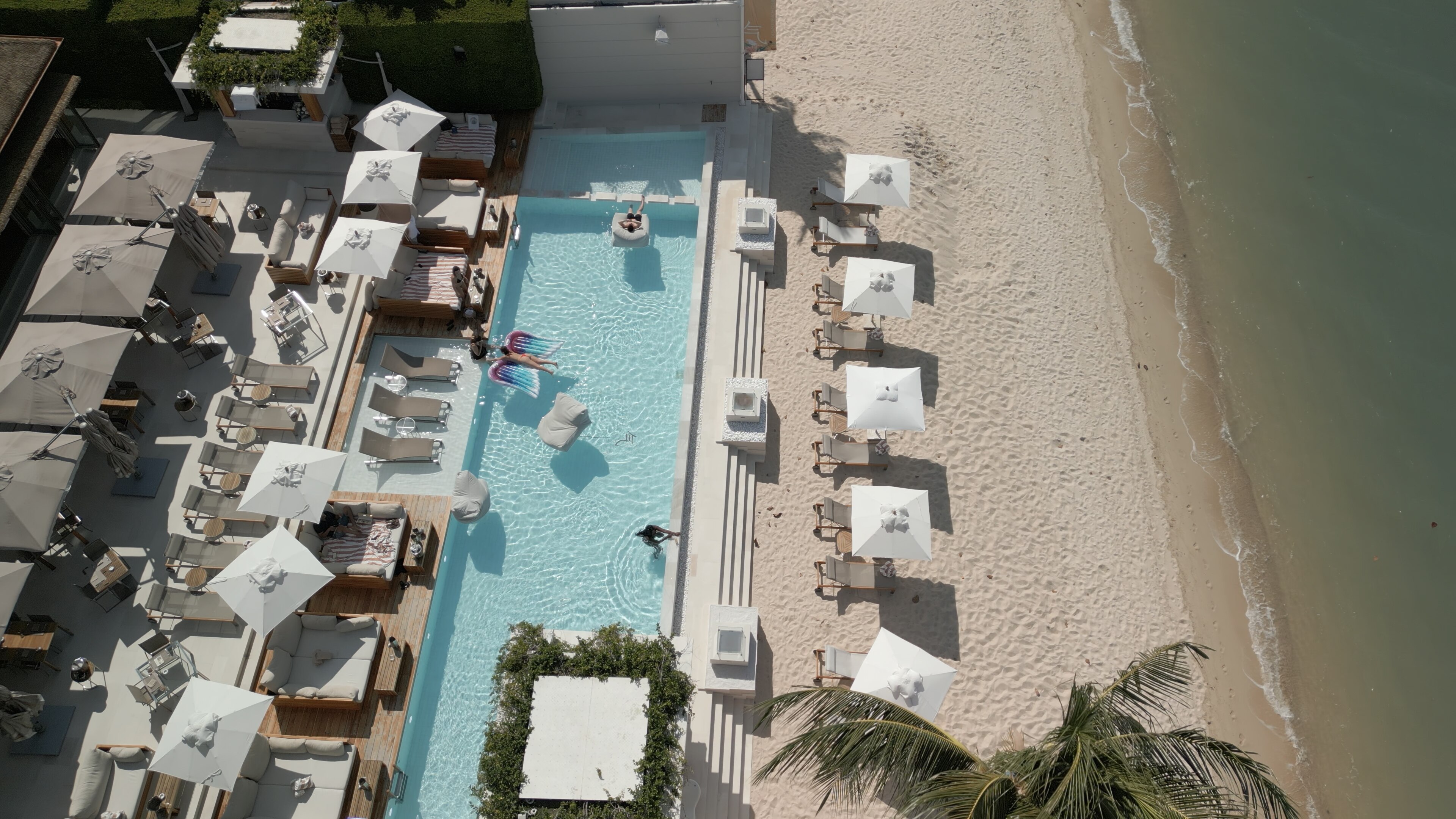 Around the pool on tropical Koh Samui, tourists sip champagne – and now, smoke joints