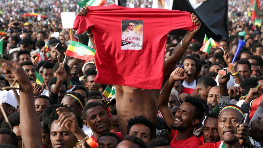 Ethiopians attend a rally in support of the new Prime Minister Abiy Ahmed