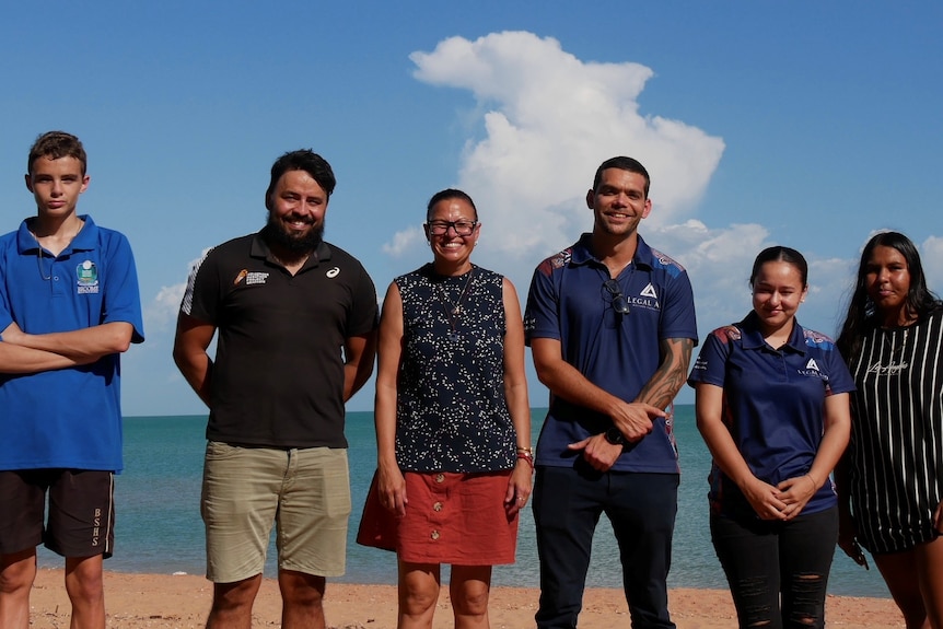 The Legal Aid Ay What Now project team stands on Town Beach in Broome. 