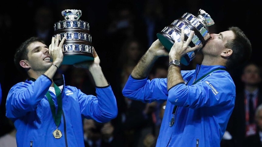 Making history ... Juan Martin Del Potro (R) and Federico Delbonis celebrate winning the Davis Cup final for Argentina