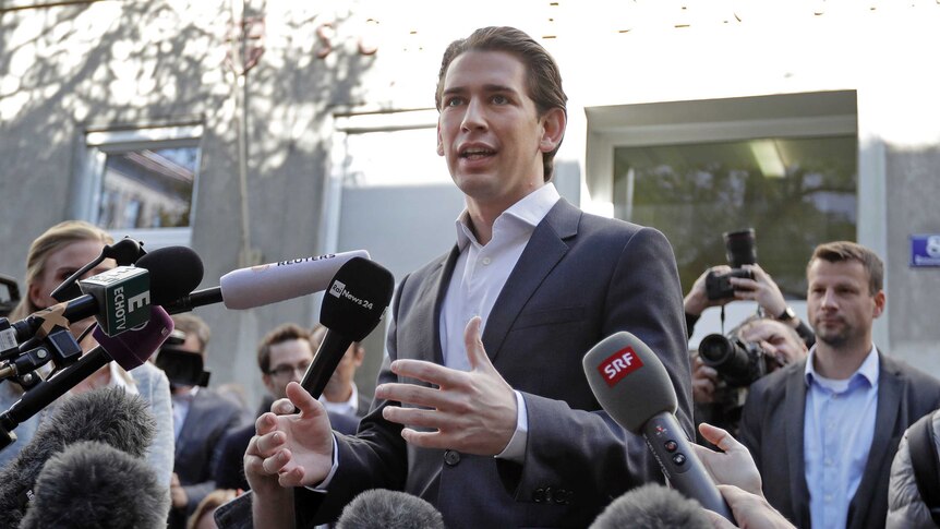 Foreign Minister Sebastian Kurz, head of Austrian People's Party, talks to the media.