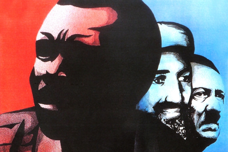 A poster depicting Ugandan war criminal Joseph Kony next to Osama Bin Laden and Adolf Hitler.