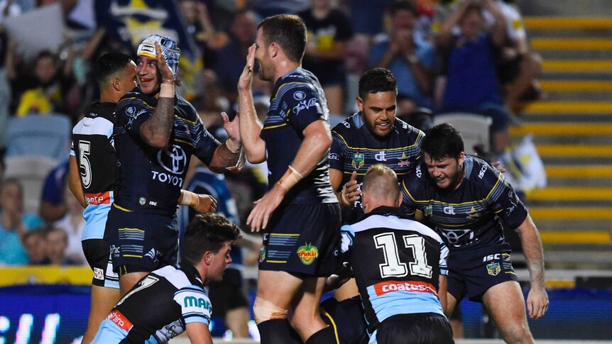 Cowboys celebrate win over Sharks