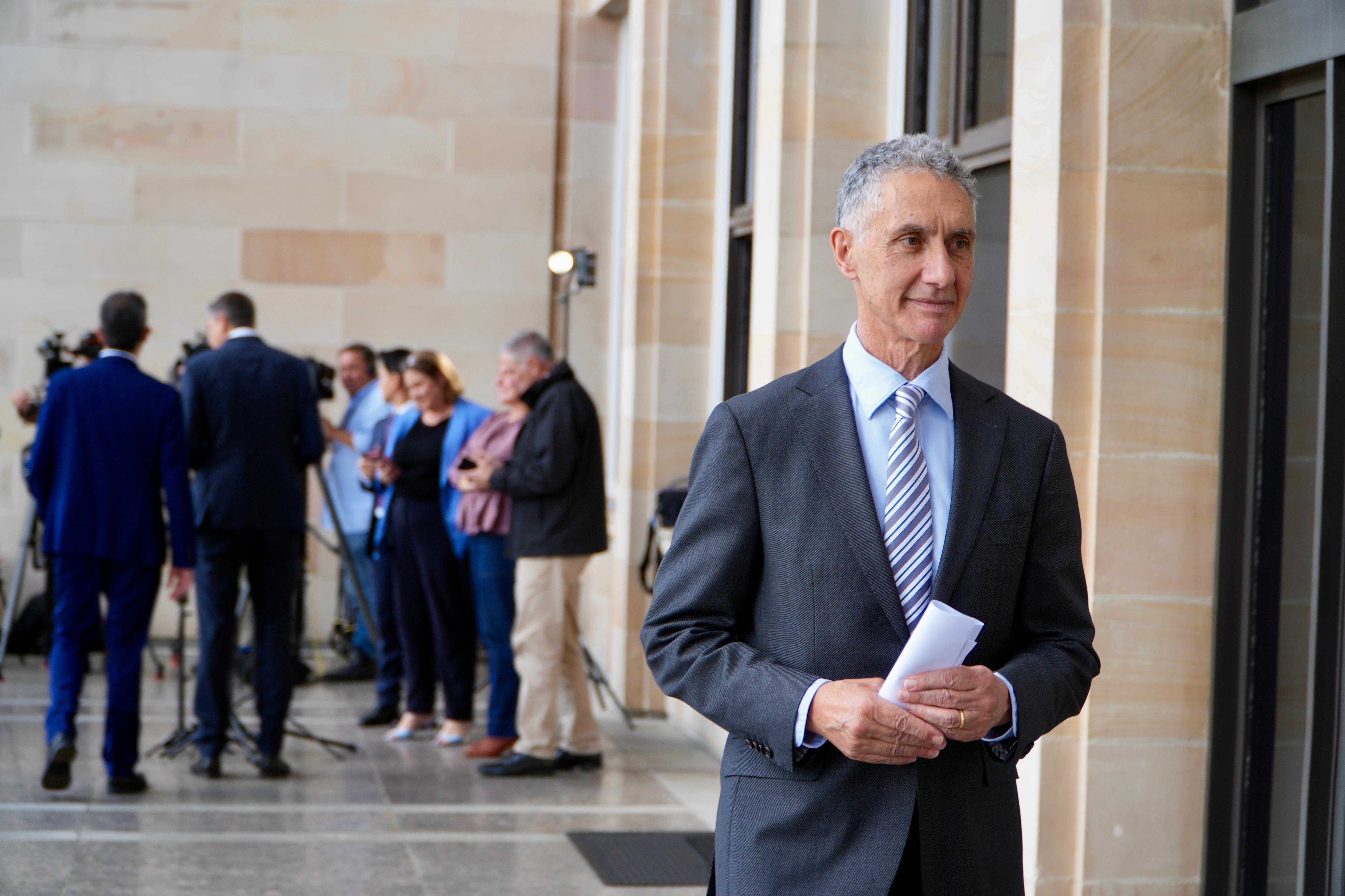 Tony Buti walks away from a press conference