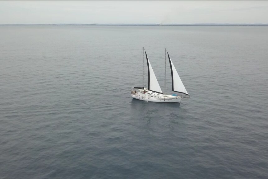 Bird's eye view of the Willems sailing boat on the water.