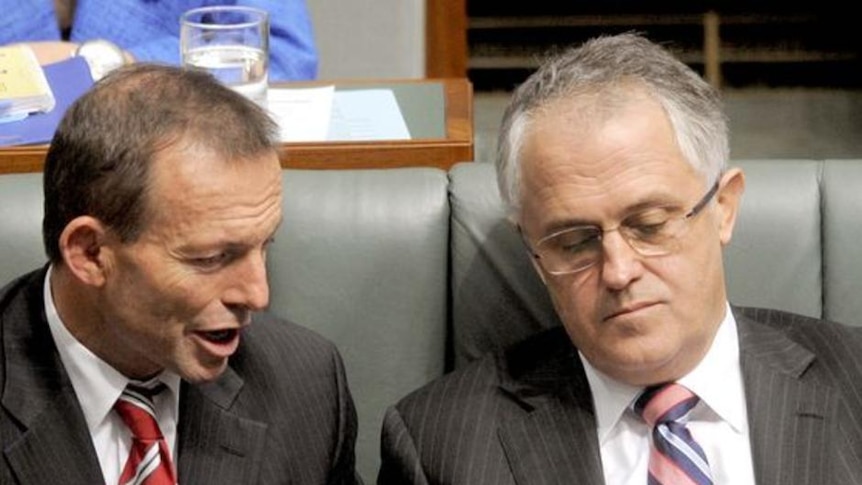 Tony Abbott speaks to Opposition leader Malcolm Turnbull