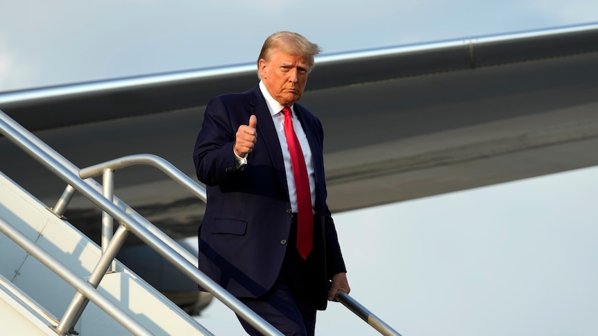 Trump in Prison Wear Thermal Tumbler