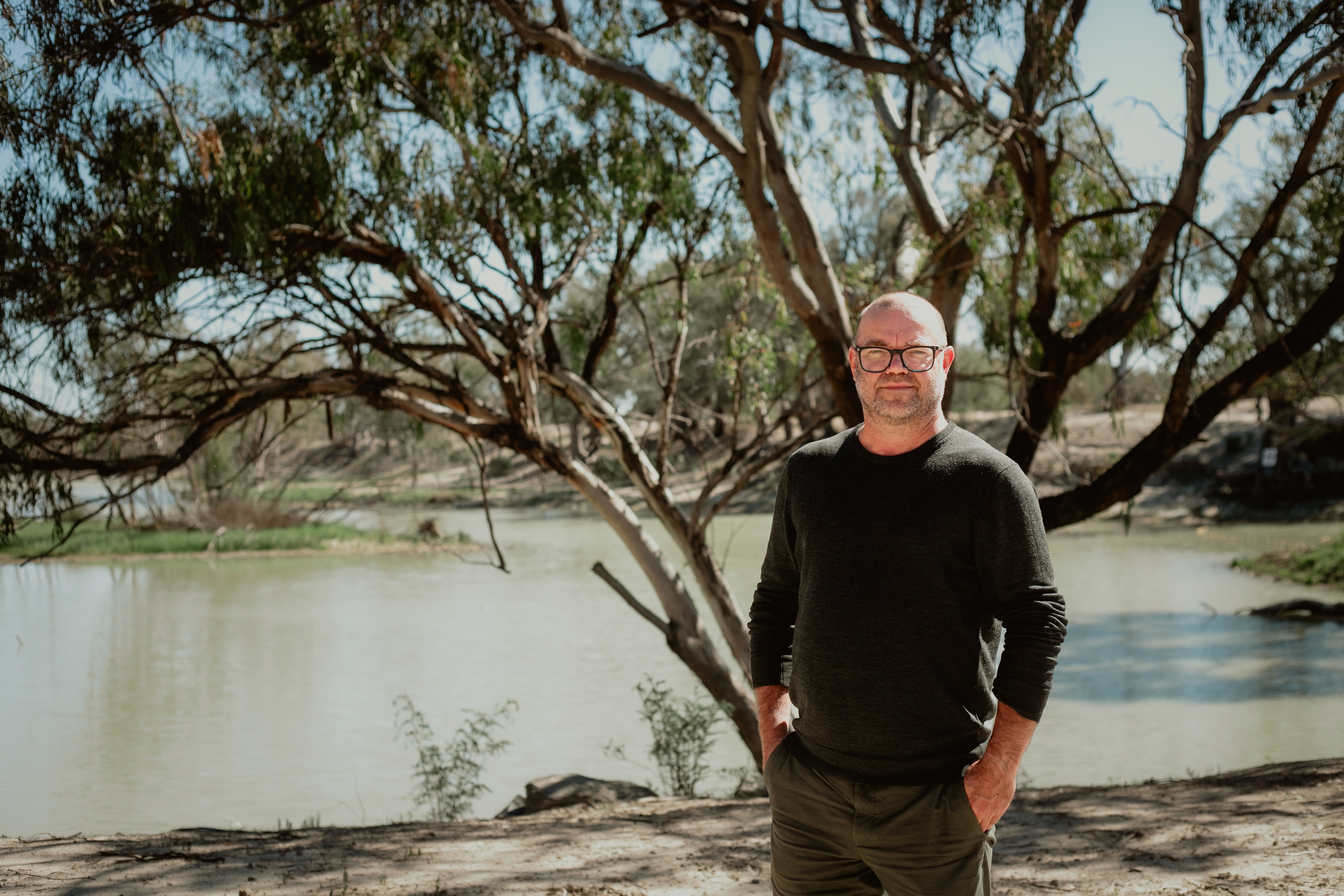 Director of Freshwater Fisheries and Threatened Species, Cameron Lay, stands in front of the Fishheart passage.