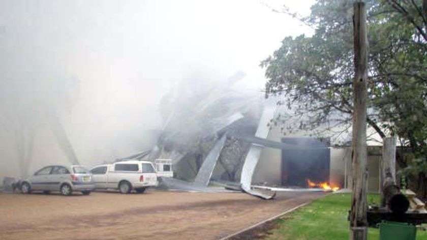 Debris lays strewn after an explosion at Drayton's Family Wines