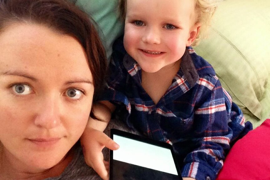 Author and journalist Samantha Turnbull and her son on an iPad for story on children and screentime