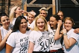 Women members of the 'Sexual Violence Won't Be Silenced' (SVWBS) group pose in white campaign t-shirts.