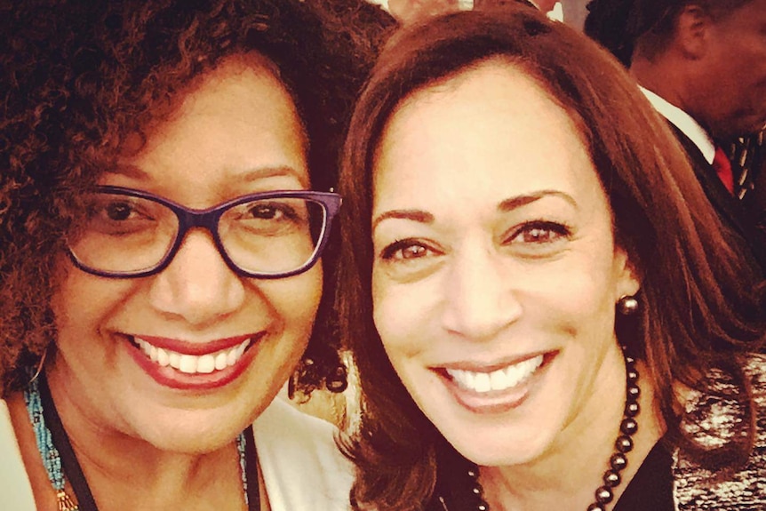 Lisa Sharon Harper and Kamala Harris smile for the camera.