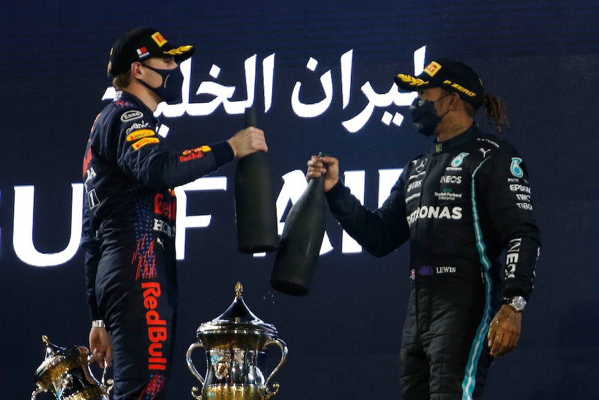 Max Verstappen and Lewis Hamilton on the podium
