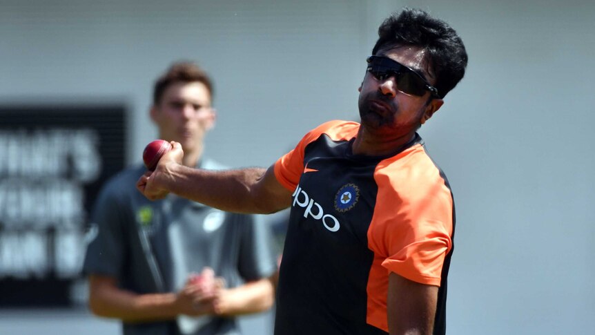 Ravi Ashwin, wearing sunglasses, bowls at an India training session at the SCG.