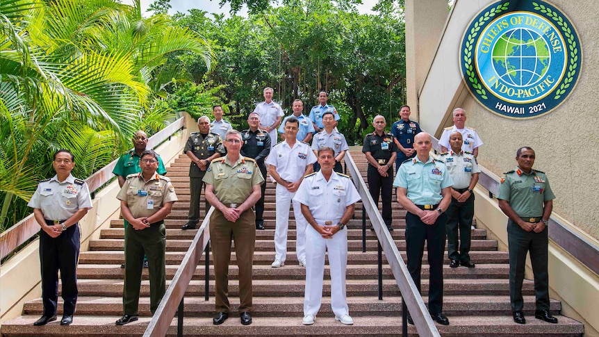Defence leaders pose for a photo during meetings