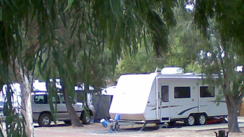 Caravan and 4 wheel drive at a caravan park