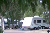 Caravan and 4 wheel drive at a caravan park