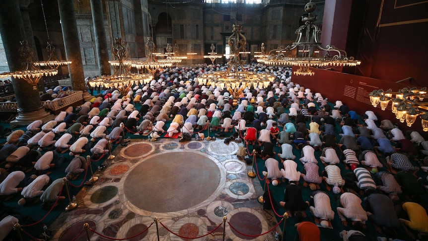 Muslims pray at Hagia Sophia Mosque.