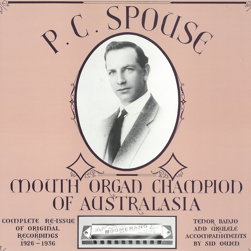 A PC Spouse album cover with a black-and-white image of a man. 