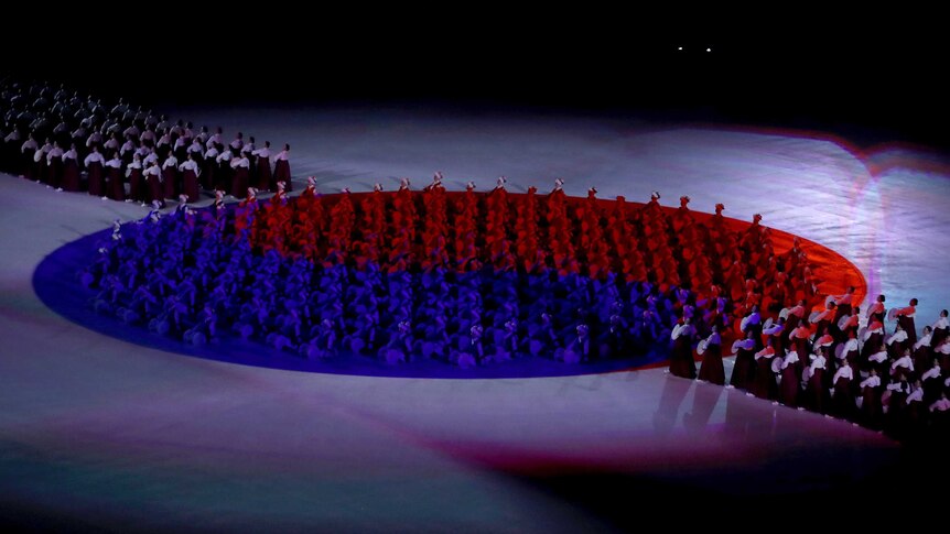 Performers make the shape of the Republic of Korea flag