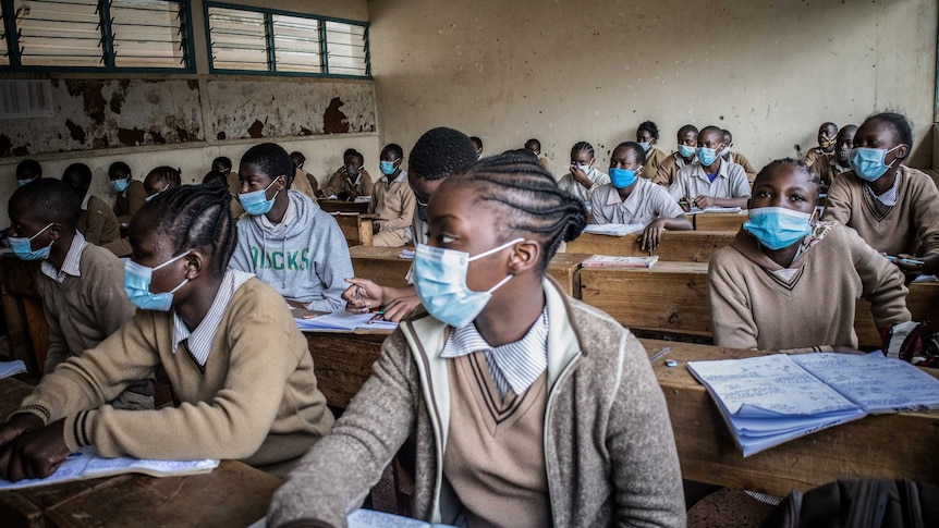 Pupils in class wearing face masks as a precaution at Ayany Primary School in Nairobi, Kenya