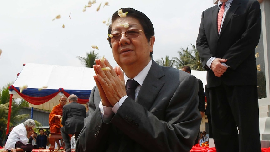 Sok An prays at a ceremony in Phnom Penh, Cambodia.