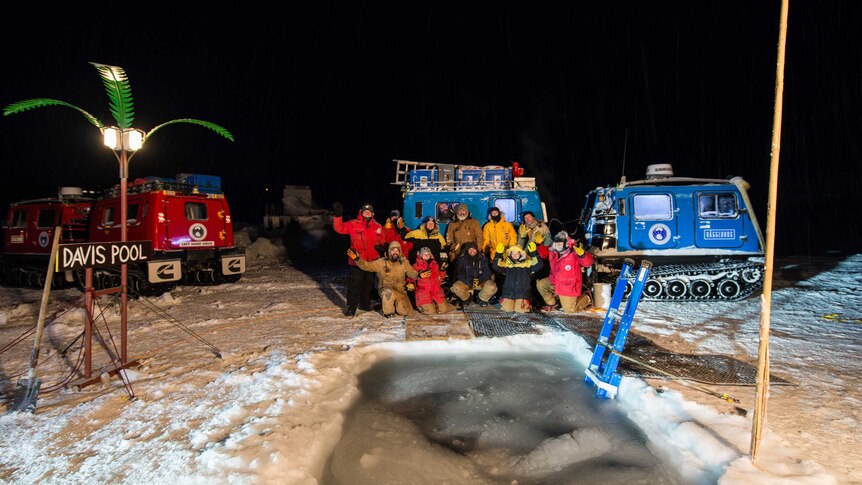 Australian Antarctic Division staff at Davis research station after the 2014 winter solstice swim.