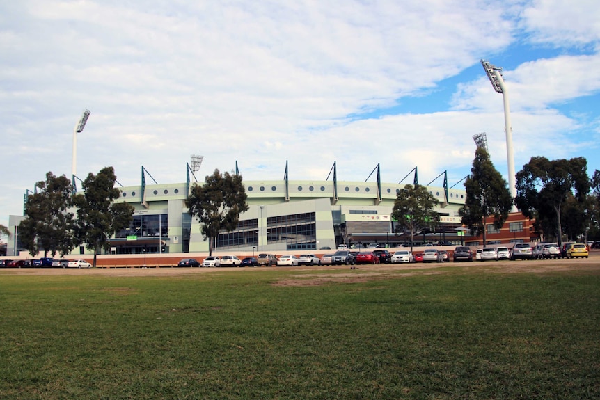 An external view of Subiaco Oval, with some of the grass in the foreground.