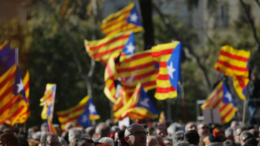Thousands take to the streets of Barcelona in support of Catalan politicians charged over independence vote