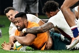 Wallabies player scores a try against england in first Test in England.