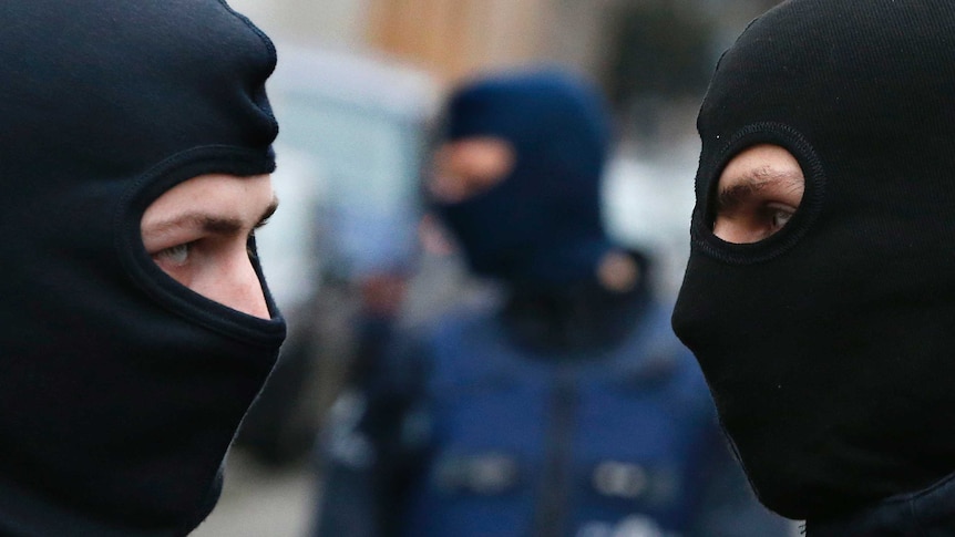 Belgian special forces in balaclavas.
