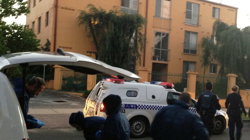 Forensic officers outside South Perth units