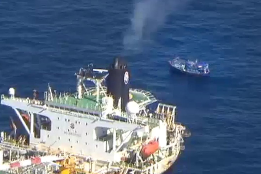 Suspected asylum seeker boat near cargo ship off Dampier, WA