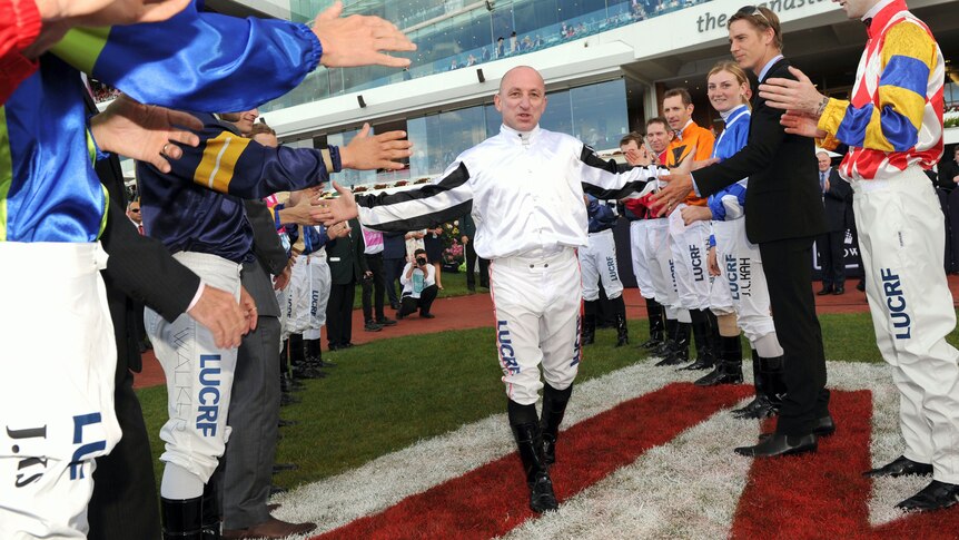 Honour guard formed for Jim Cassidy at Flemington