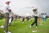 Greg Norman hosts a coaching clinic with China's national golf team in Haikou, China.