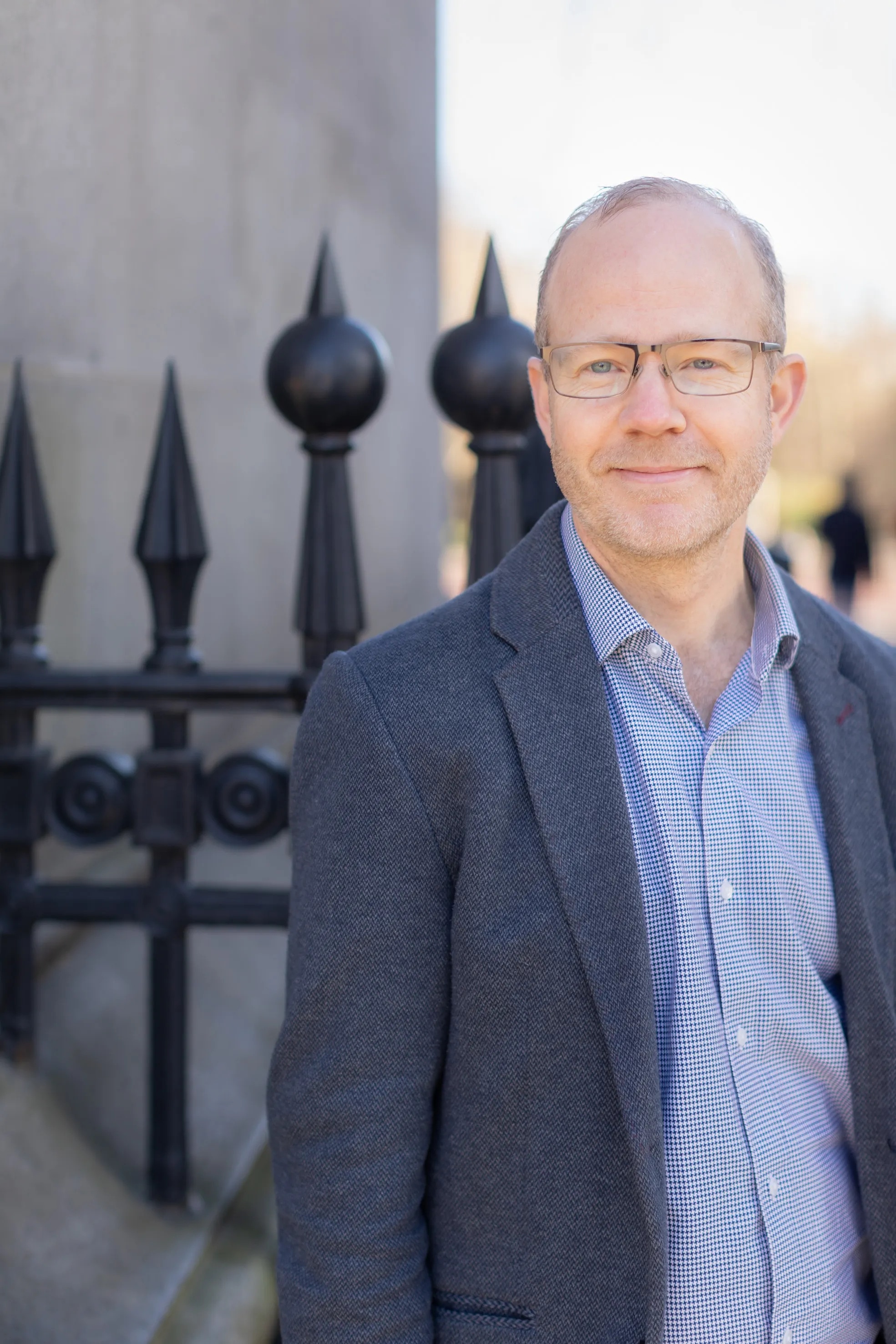 A headshot of Matthew Rubery, with his face on the right side of the image.