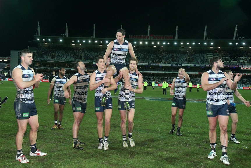 Harry Taylor chaired off ground after 150th game