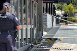 Police at the scene where a 24yo man was shot dead by police last night in Airlie Beach.