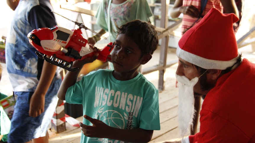 A boy from Urandangi receives a Christmas present